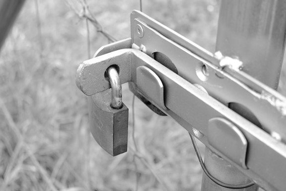 Close-up of a robust, locked door symbolizing home security against lock bumping.