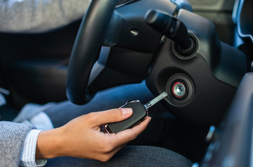 A woman holding car keys.