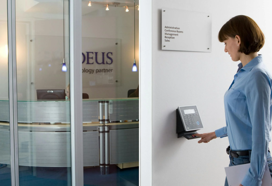 This image shows a woman using a biometric lock.