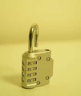 This image shows a lock on a yellow background.