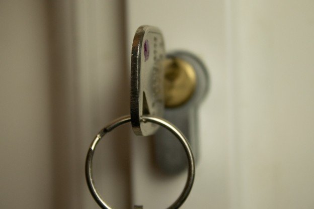 close-up of a key placed in a lock