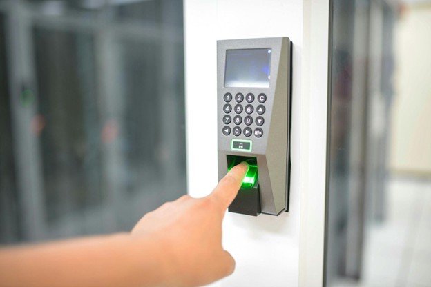 a person using biometric verification to unlock door